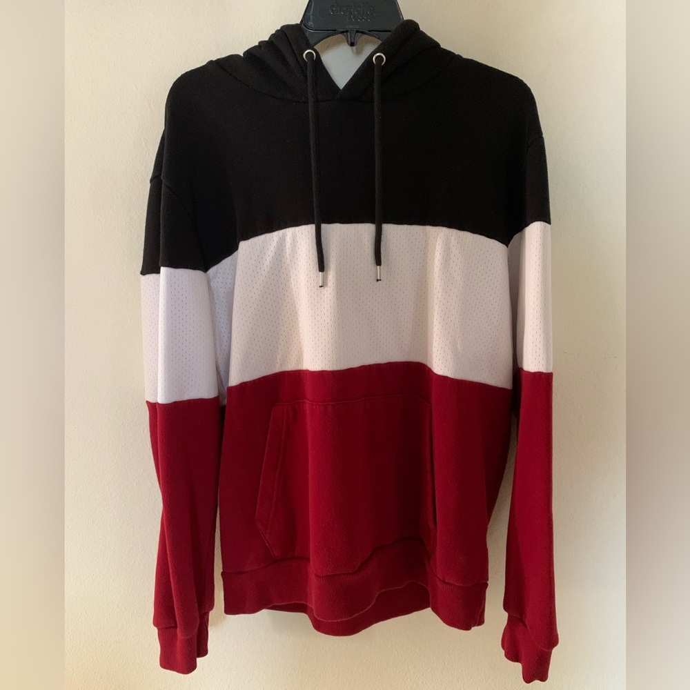 Multicolored Pullover Hoodie with a White Jersey Material: 
• Size: Large